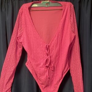 Pink bodysuit with center cuts